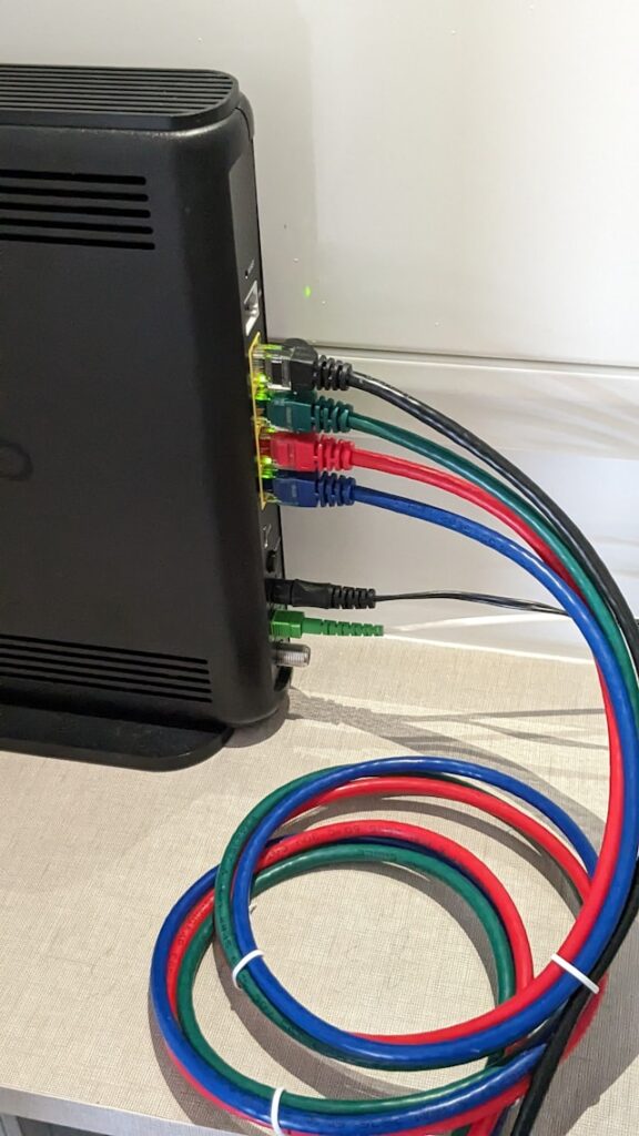 Cables connected to a modem.